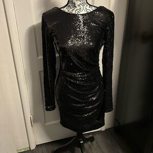 Black sequins dress for the holidays or cocktail party.